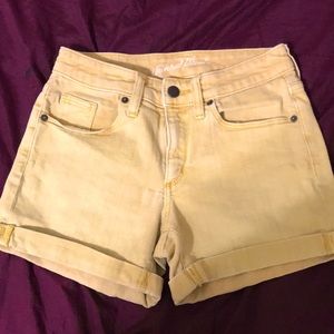 Size:00/24 bright sunflower yellow midwaisted denim shorts brand:UniversalThread